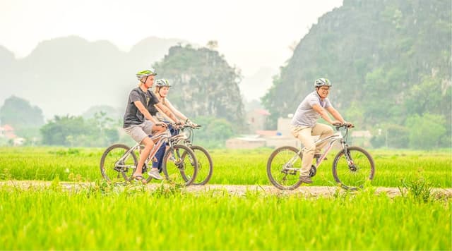 In the afternoon: Fishing & Biking & return to Hanoi