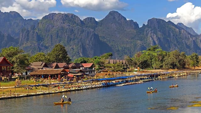 Day 2: Vientiane – Buddha Park – Train to Vang Vieng