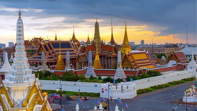 Day 2: Chiang Rai City Tour – Temples, Black House & Mae Kok River Cruise (B)